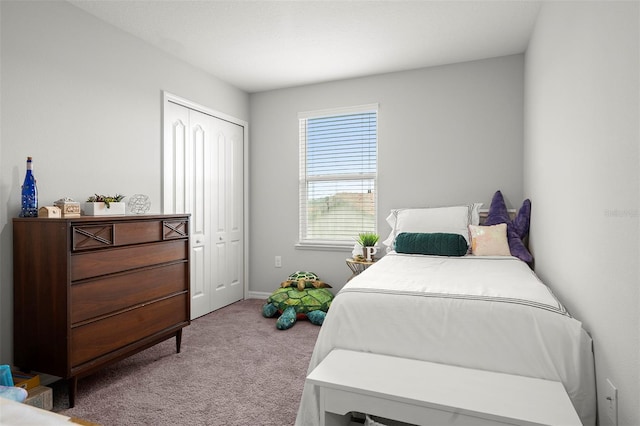 carpeted bedroom featuring a closet