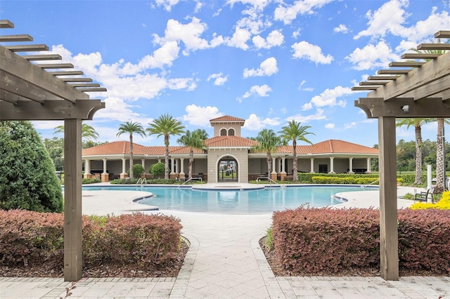 view of pool with a patio area and a pergola