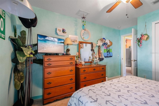 bedroom featuring light carpet and ceiling fan