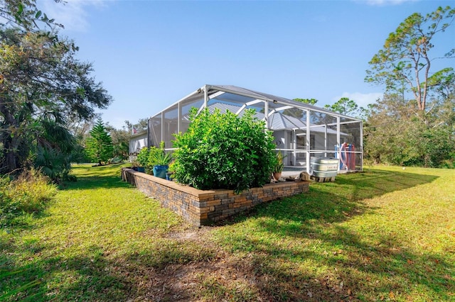 view of yard with a lanai