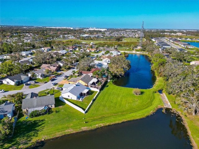 bird's eye view with a water view and a residential view