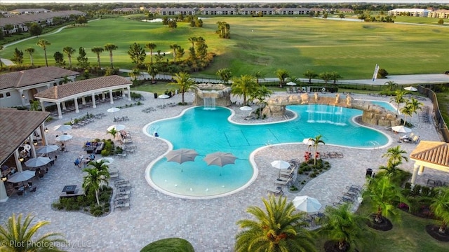 view of pool featuring a patio and pool water feature