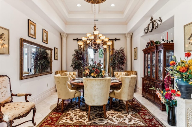 dining area with baseboards, coffered ceiling, crown molding, ornate columns, and a notable chandelier