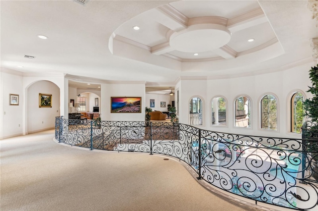 corridor with carpet floors, recessed lighting, visible vents, ornamental molding, and coffered ceiling