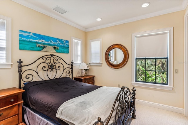 carpeted bedroom with ornamental molding, recessed lighting, visible vents, and baseboards