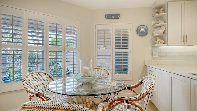 dining room featuring a healthy amount of sunlight