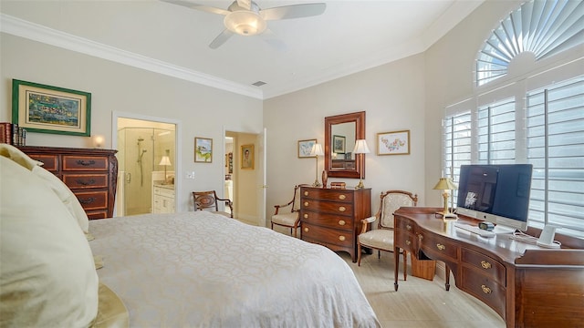 bedroom with crown molding, connected bathroom, and ceiling fan