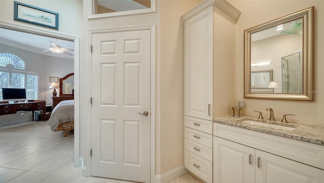 full bathroom with vanity and ensuite bath