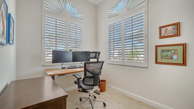 office with light carpet and plenty of natural light