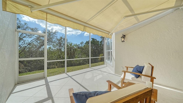 sunroom / solarium featuring a healthy amount of sunlight