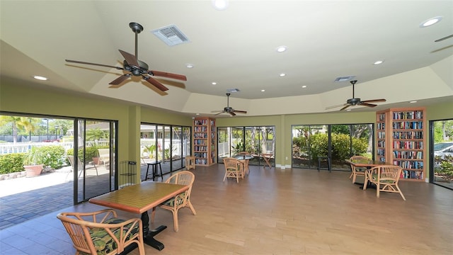 interior space featuring recessed lighting, visible vents, high vaulted ceiling, and wood finished floors