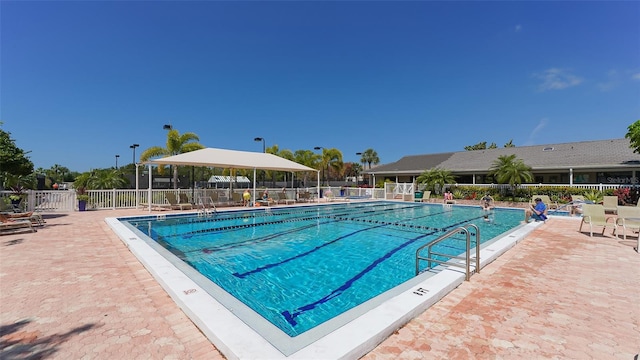 view of pool featuring a patio area