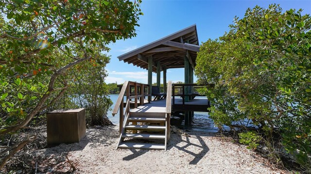 exterior space with a gazebo and a water view