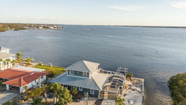 drone / aerial view with a water view