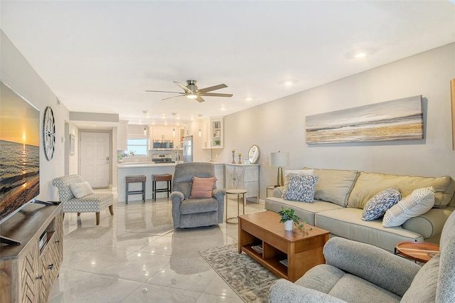 living room with ceiling fan