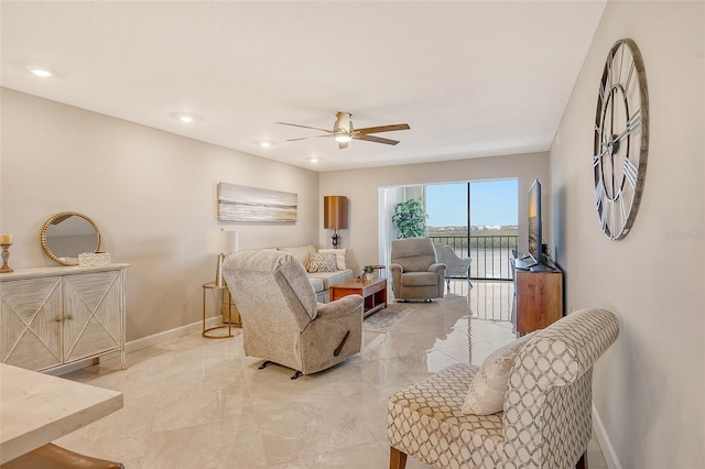 living room with ceiling fan