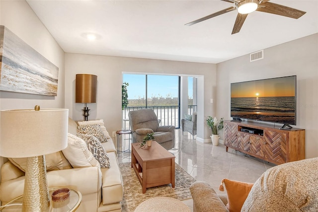 living room with ceiling fan