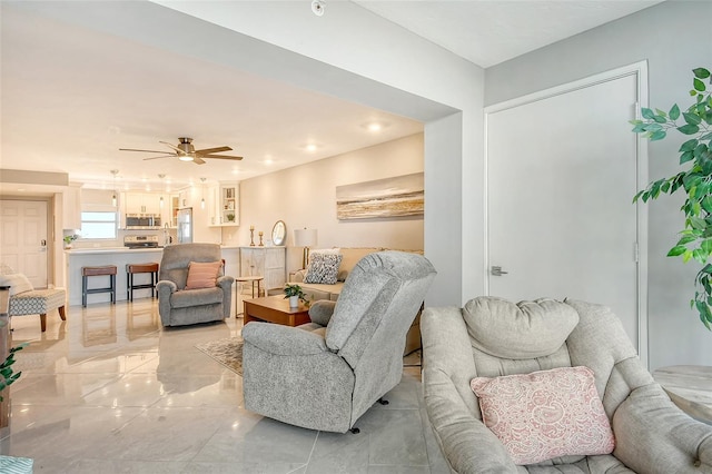 living room with ceiling fan