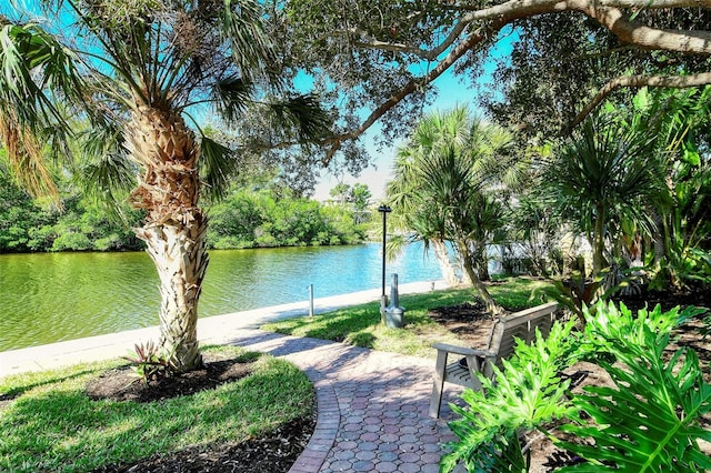 surrounding community featuring a water view