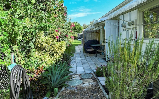 view of home's exterior with a patio