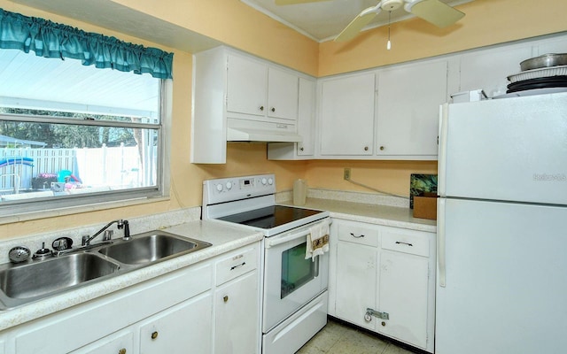 kitchen featuring white appliances, ceiling fan, white cabinetry, and sink