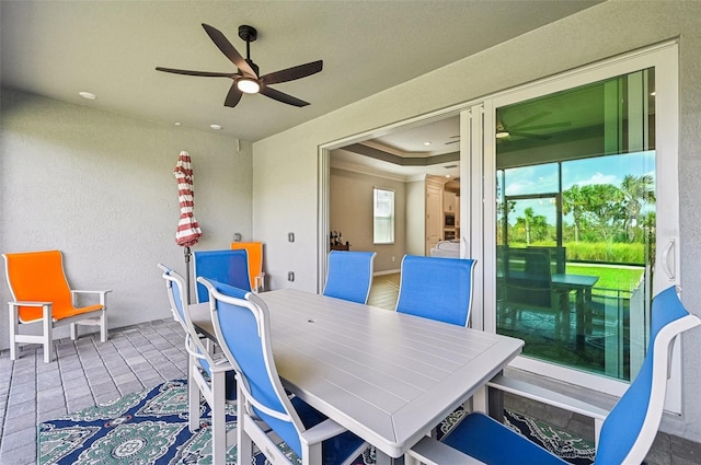 view of patio / terrace featuring ceiling fan