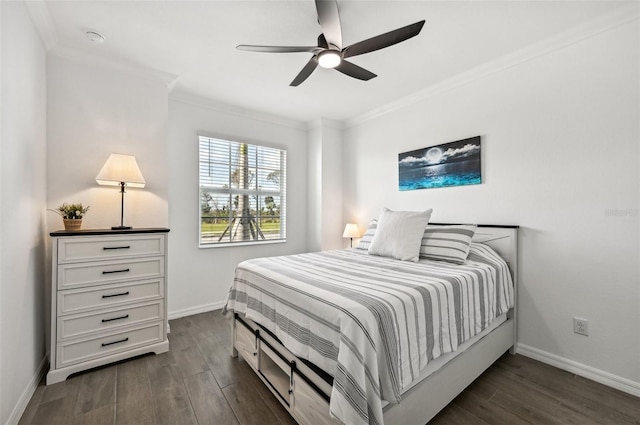 bedroom with ornamental molding, dark hardwood / wood-style floors, and ceiling fan