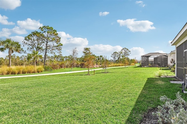 view of yard featuring a lanai