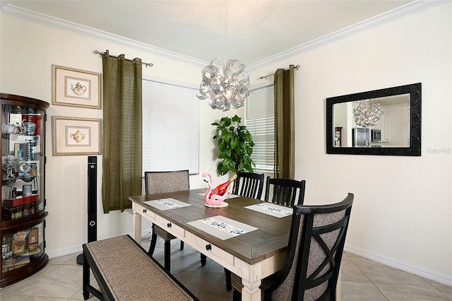 dining room featuring a notable chandelier, ornamental molding, and light tile patterned flooring