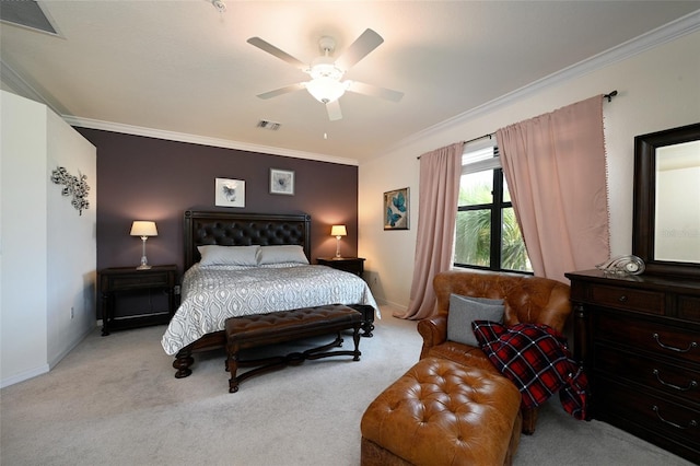 carpeted bedroom featuring crown molding and ceiling fan