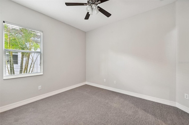 unfurnished room with carpet floors and ceiling fan