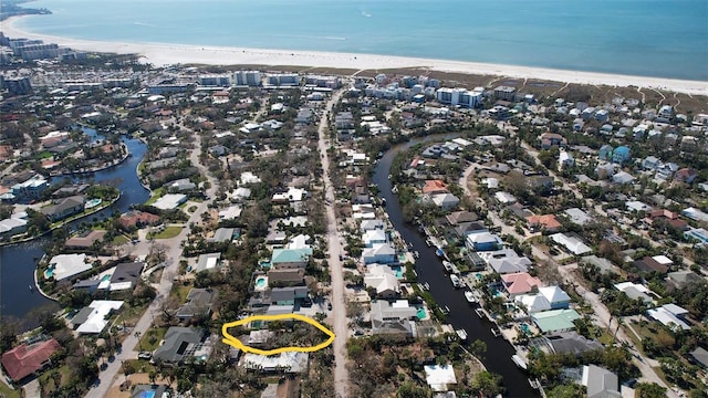 drone / aerial view with a view of the beach and a water view