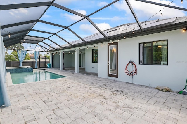 view of pool with a patio and a lanai