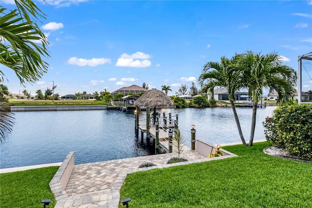 view of dock featuring a water view and a lawn