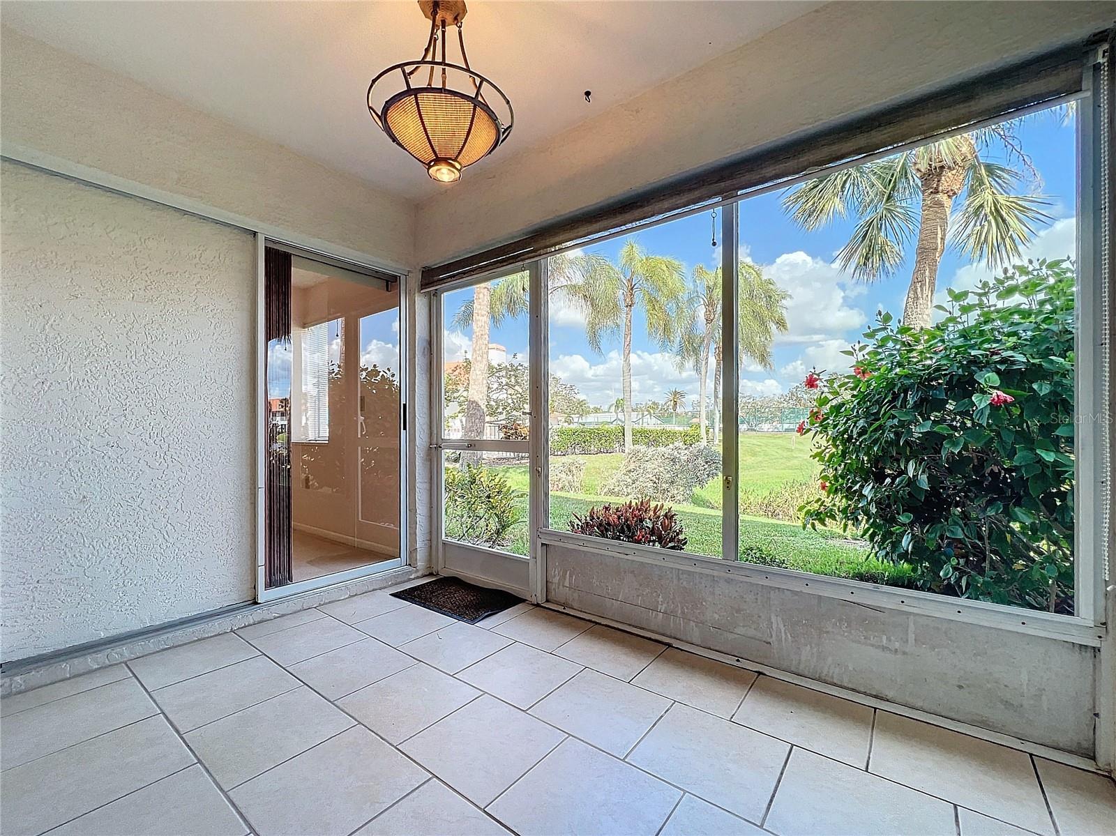 unfurnished sunroom featuring plenty of natural light