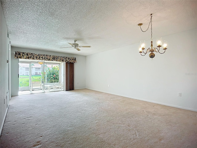 4382 Madeira Ct Unit 3361, Sarasota, FL 34233 - spare room featuring a textured ceiling, light colored carpet, a chandelier, ceiling fan, and baseboards
