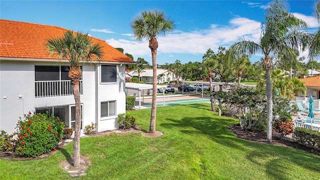 4382 Madeira Ct Unit 3361, Sarasota, FL 34233 - view of green lawn with shuffleboard