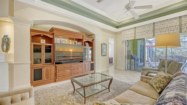 21 Bayhead Ln, Osprey, FL 34229 - living area featuring ceiling fan, crown molding, light tile patterned flooring, a sunroom, and baseboards