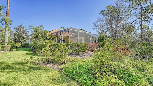 view of yard featuring a lanai