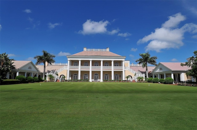 21 Bayhead Ln, Osprey, FL 34229 - view of building exterior featuring stairs and view of golf course