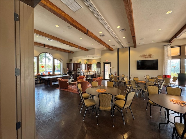 dining room with visible vents, dark wood-style flooring, a textured ceiling, beam ceiling, and recessed lighting