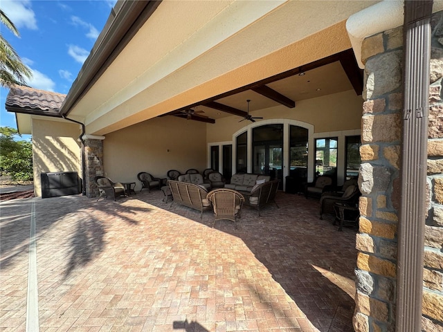 view of patio / terrace featuring outdoor lounge area and a ceiling fan