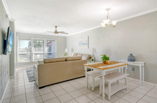 living room featuring ornamental molding, ceiling fan with notable chandelier, and light tile patterned floors