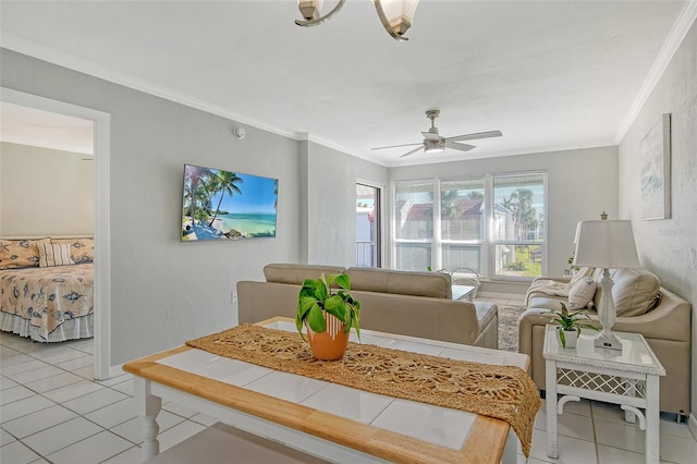 tiled dining area with crown molding and ceiling fan