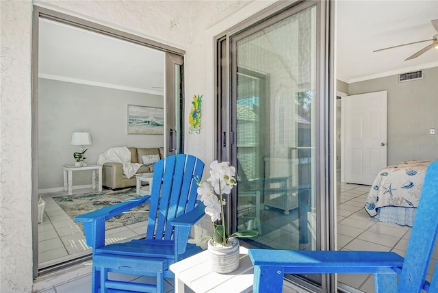 balcony featuring ceiling fan