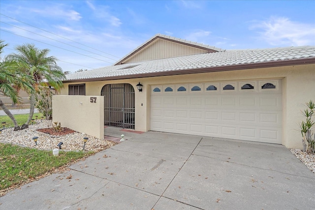 view of front of home with a garage