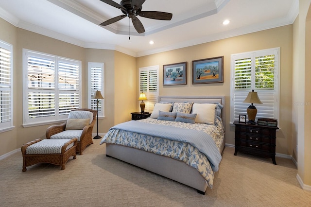 bedroom featuring multiple windows, ornamental molding, light colored carpet, and ceiling fan