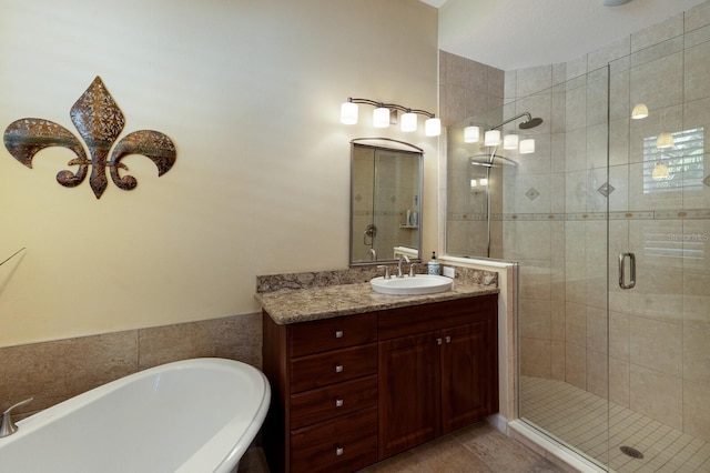 bathroom featuring vanity and plus walk in shower