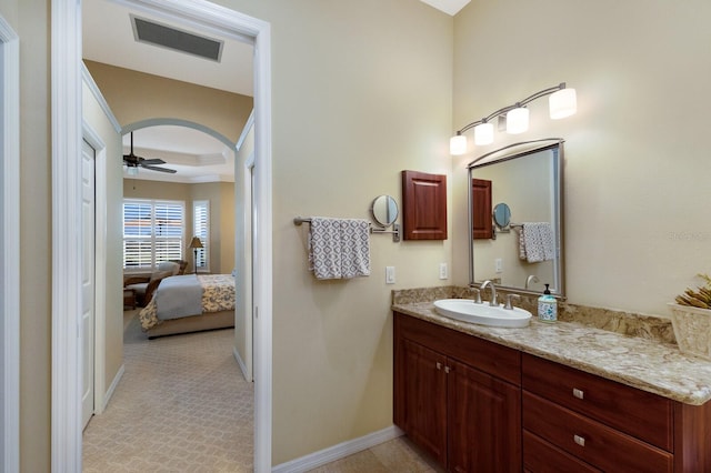 bathroom with vanity and ceiling fan