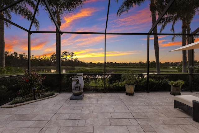 view of patio terrace at dusk